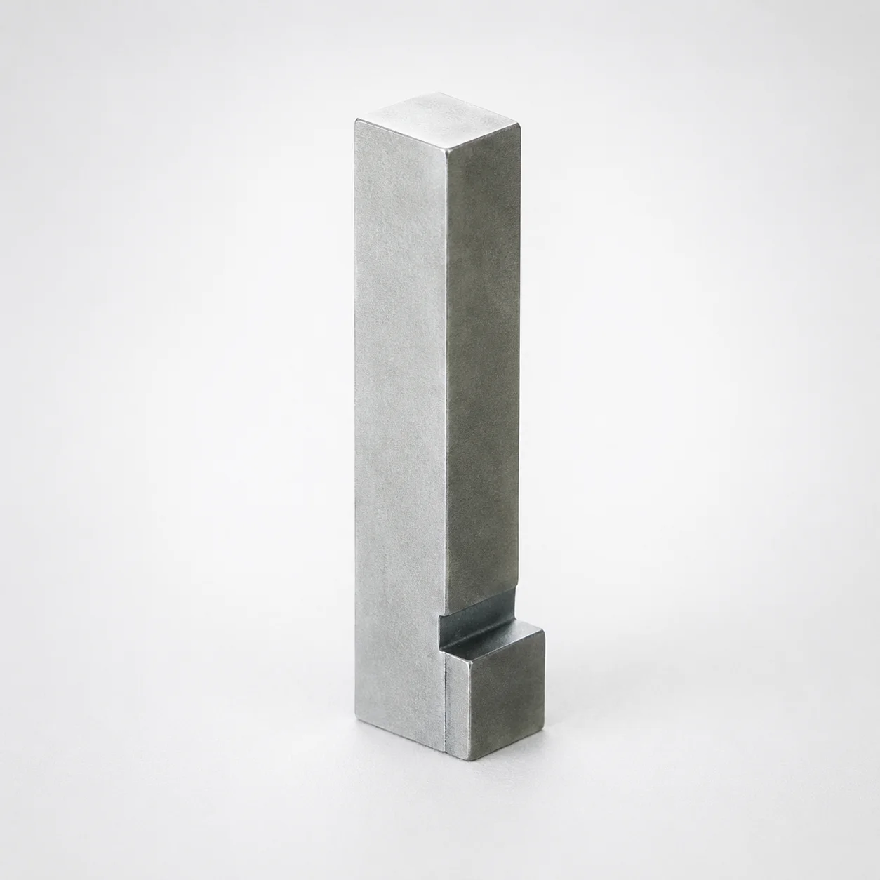 Pressed iron powder green gear compact 50 mm wide leaving a 700 MPa compaction die
